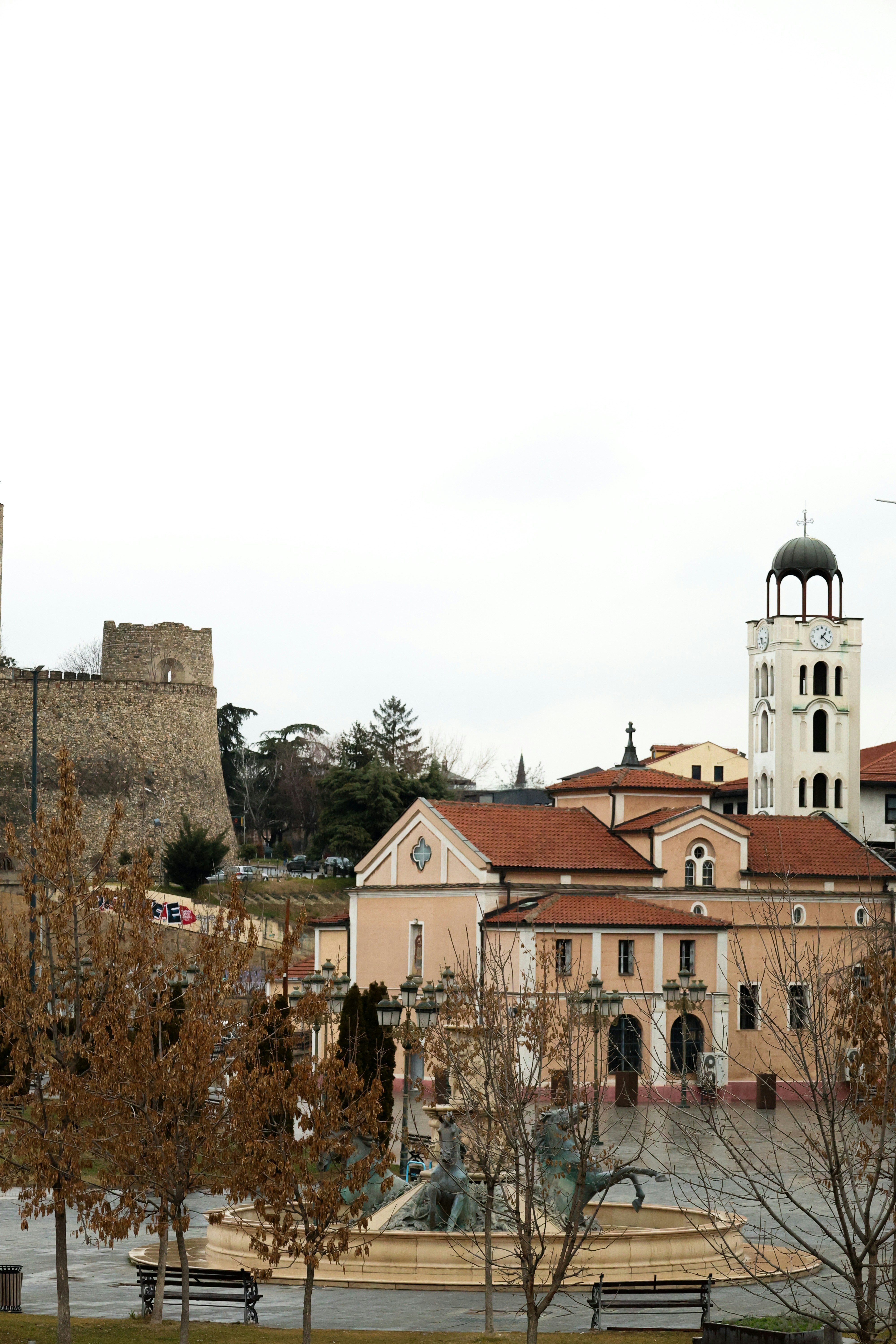 A large building with a clock tower on top of it photo – Free Building ...