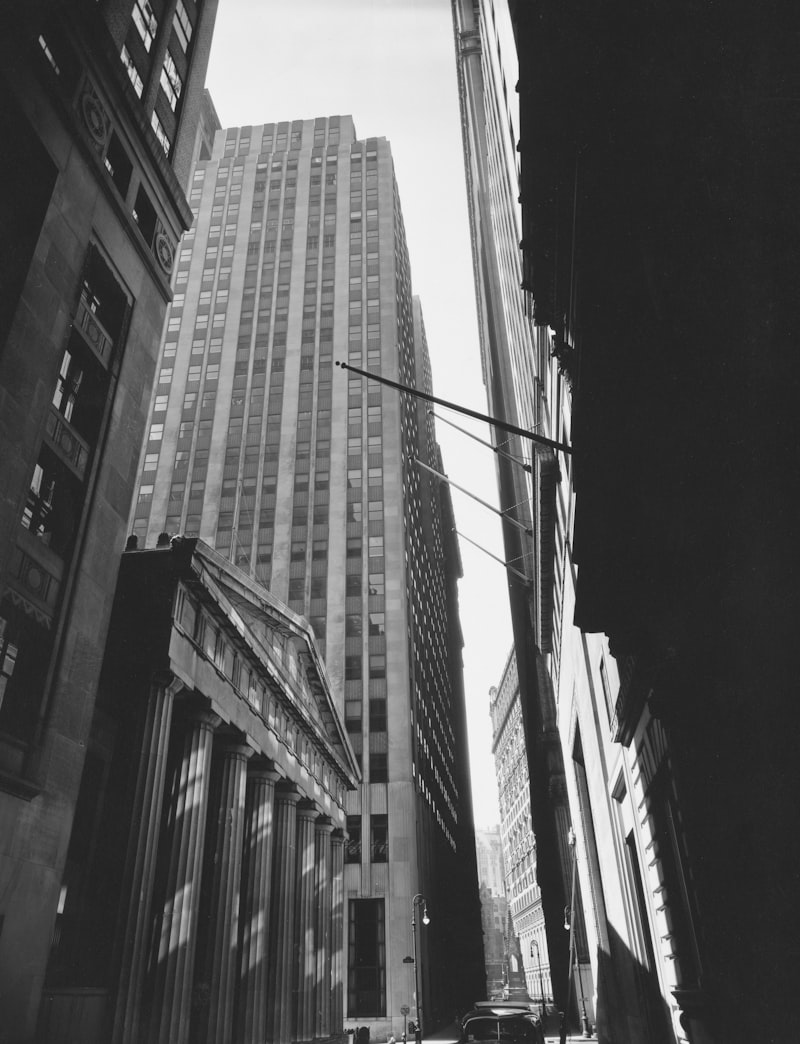 Tall buildings in a city street, looking up at the financial district