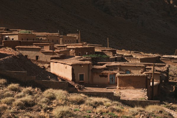 Earth-built houses at dusk — Ouarzazate, Morocco