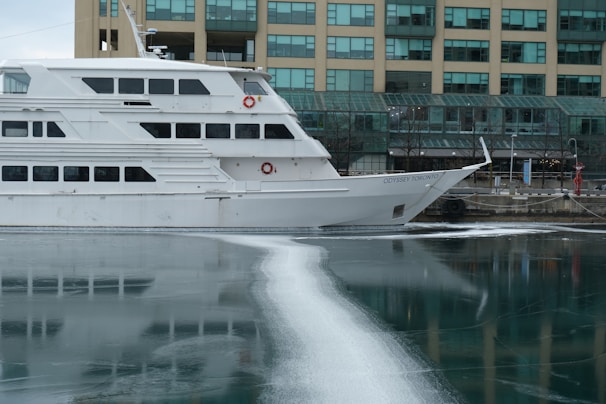 A large white boat in a body of water