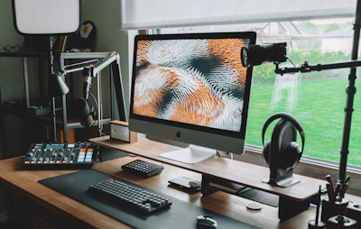 A desktop computer sitting on top of a wooden desk
