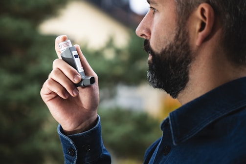 A man holding a cell phone up to his ear