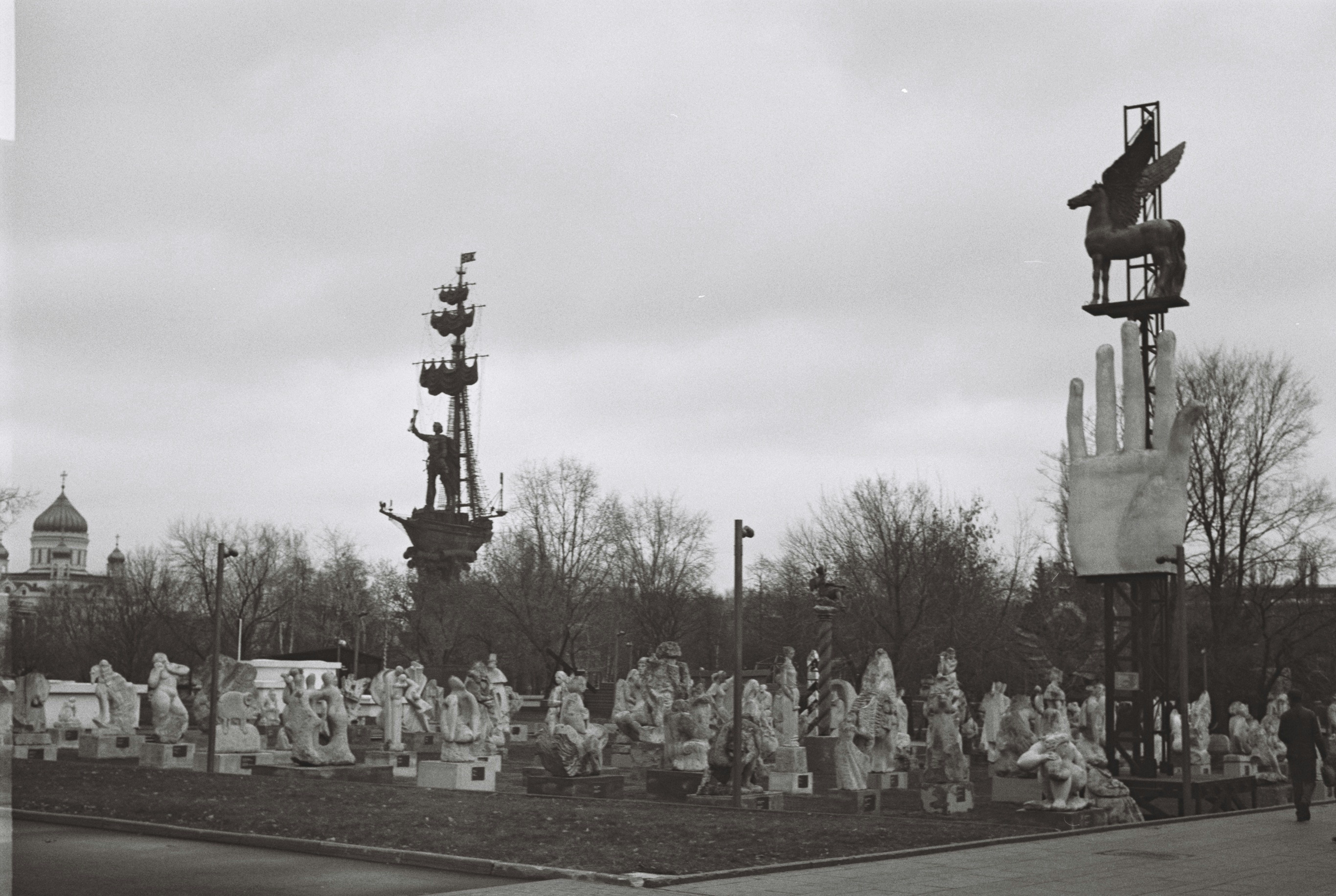 A black and white photo of a cemetery