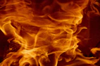 A close up of a fire burning in a fireplace