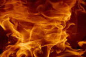 A close up of a fire burning in a fireplace