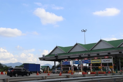 A gas station with a truck parked in front of it