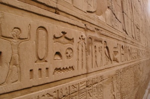 A large wall with egyptian writing on it
