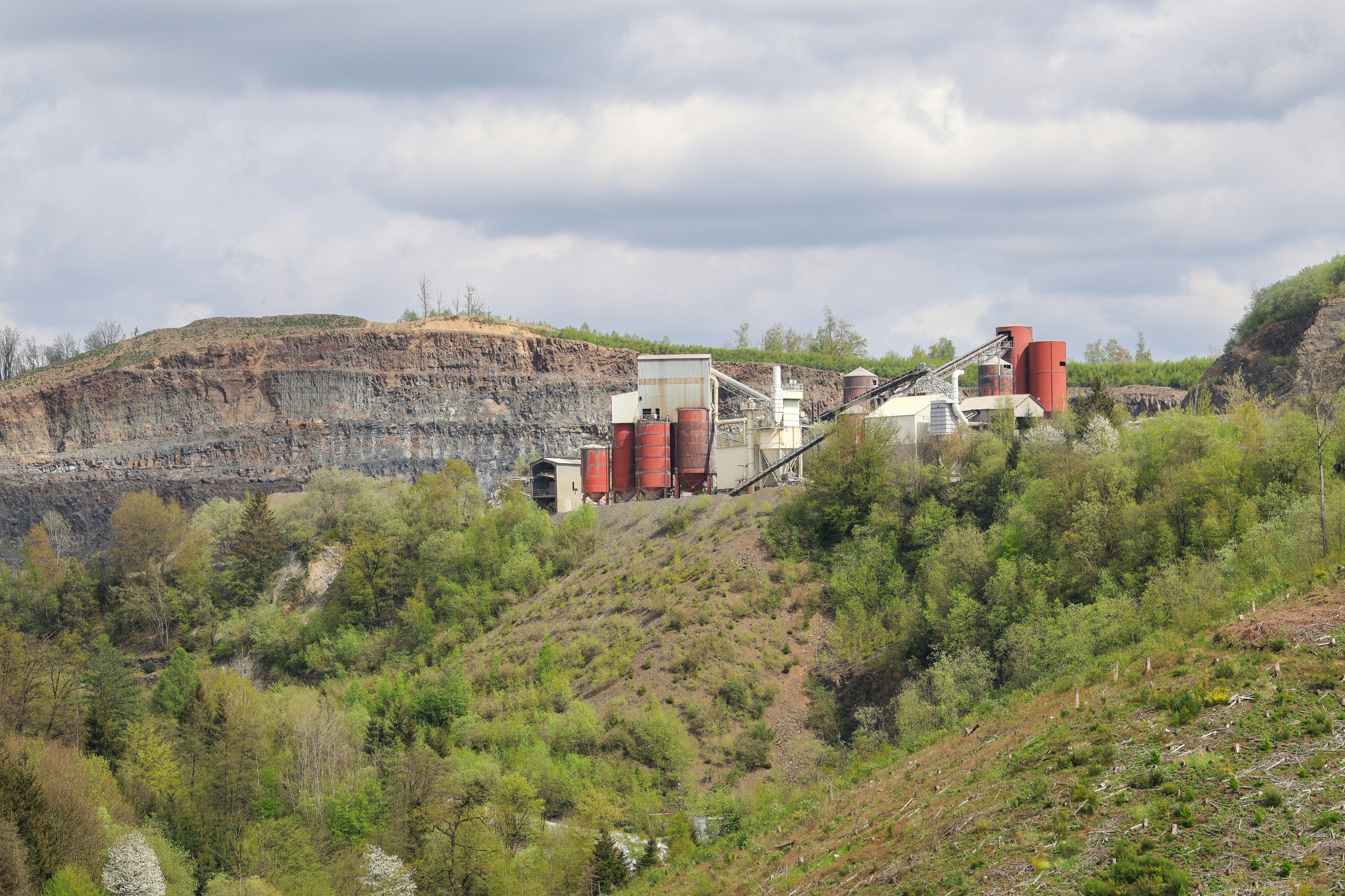 A view of a hill with a building on top of it