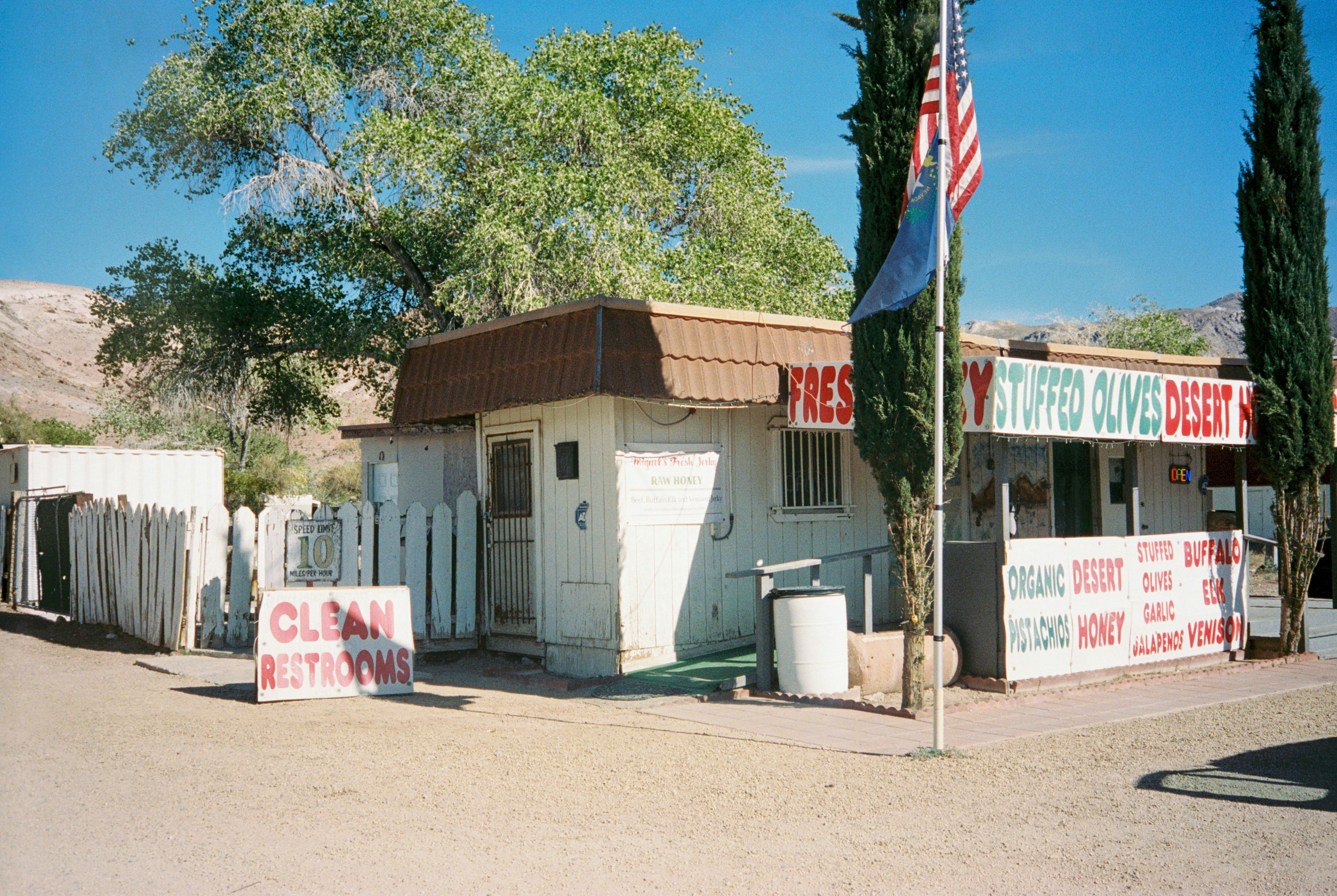 White building with flag on top