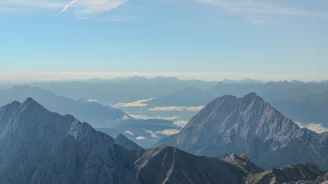 A view of mountains from the top of a mountain