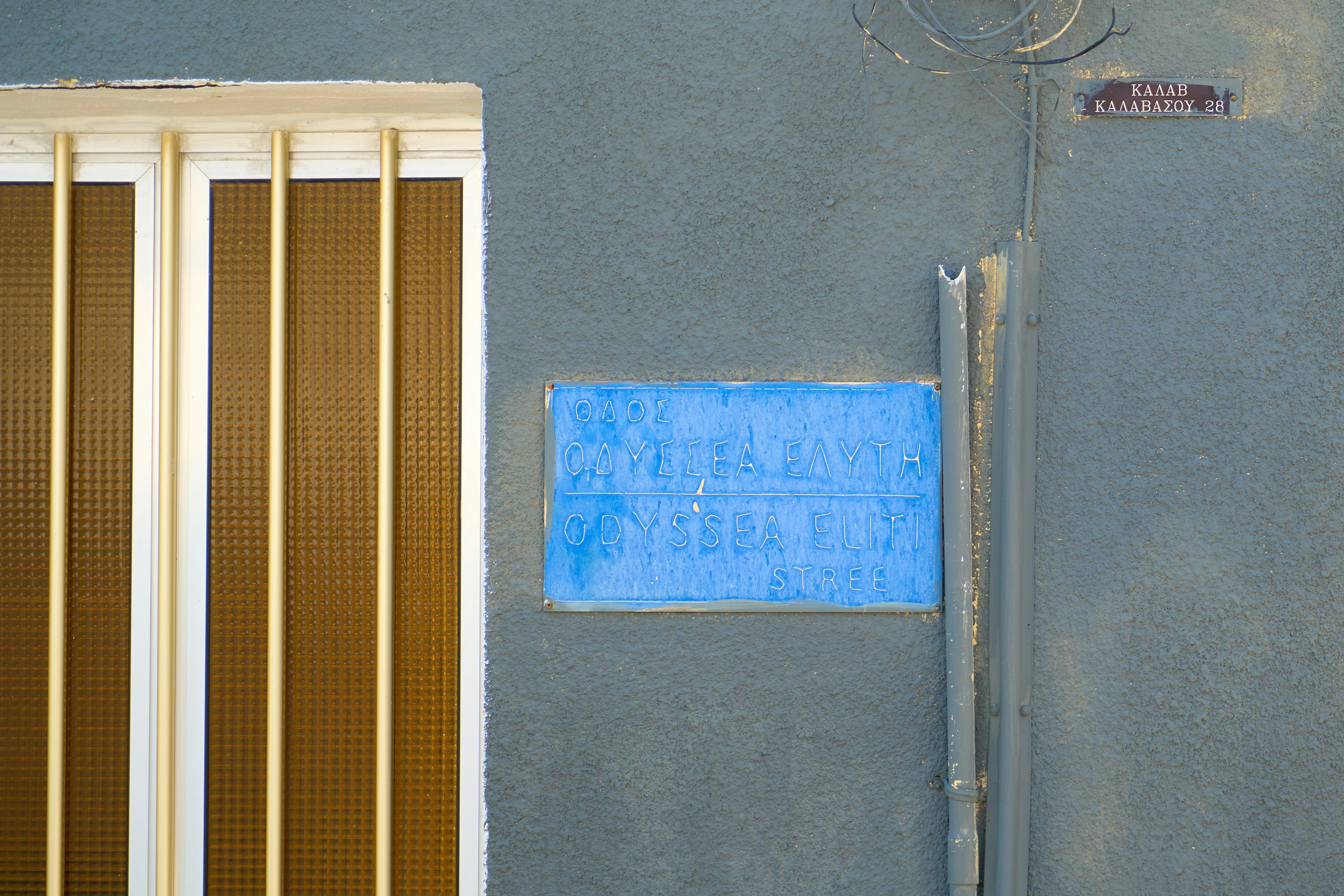 A close-up image of a LEED Gold certification plaque on a modern apartment building wall, signifying its environmental performance - Green apartments Chicago