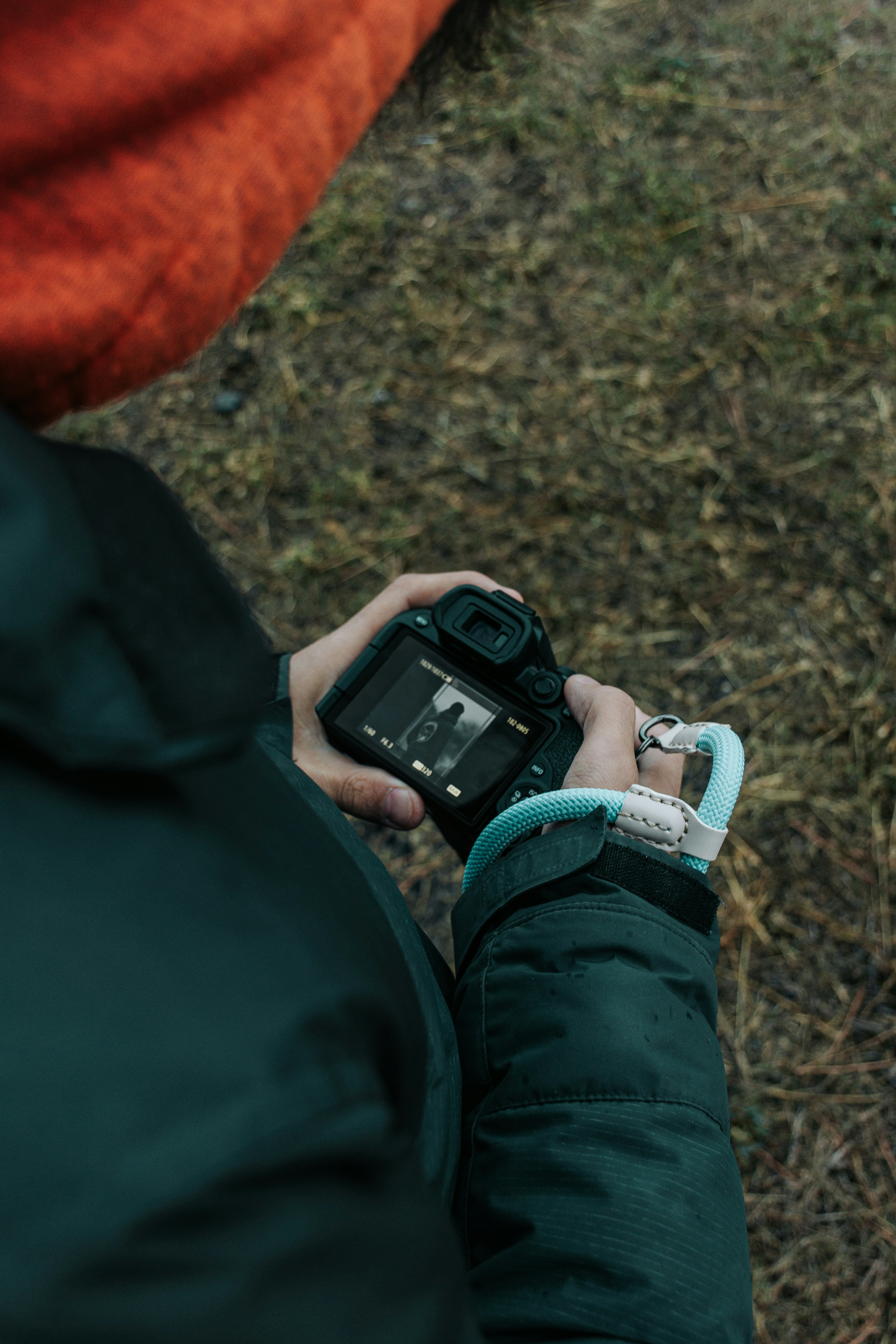 A person holding a camera in their hand