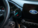 A close up of a steering wheel of a car