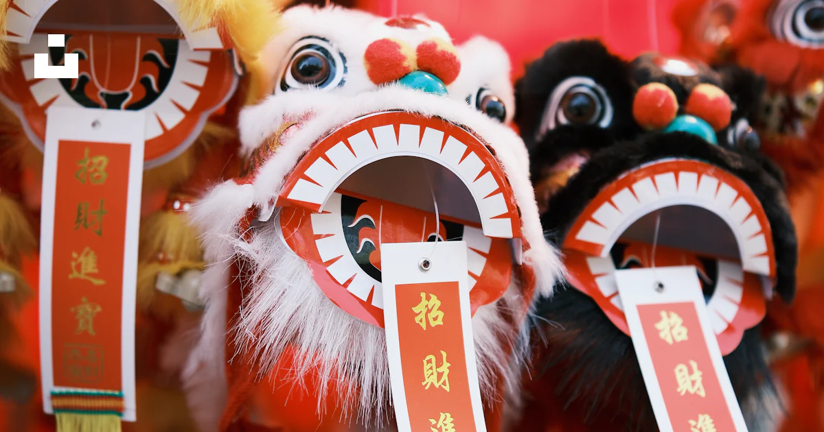 A Group Of Chinese Masks Hanging From Strings Photo Free Chinese New a-group-of-chinese-masks-hanging-from-strings-photo-free-chinese-new