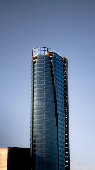 A tall building with a sky background
