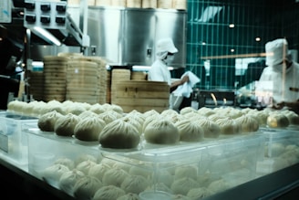 A kitchen filled with lots of food on top of a counter