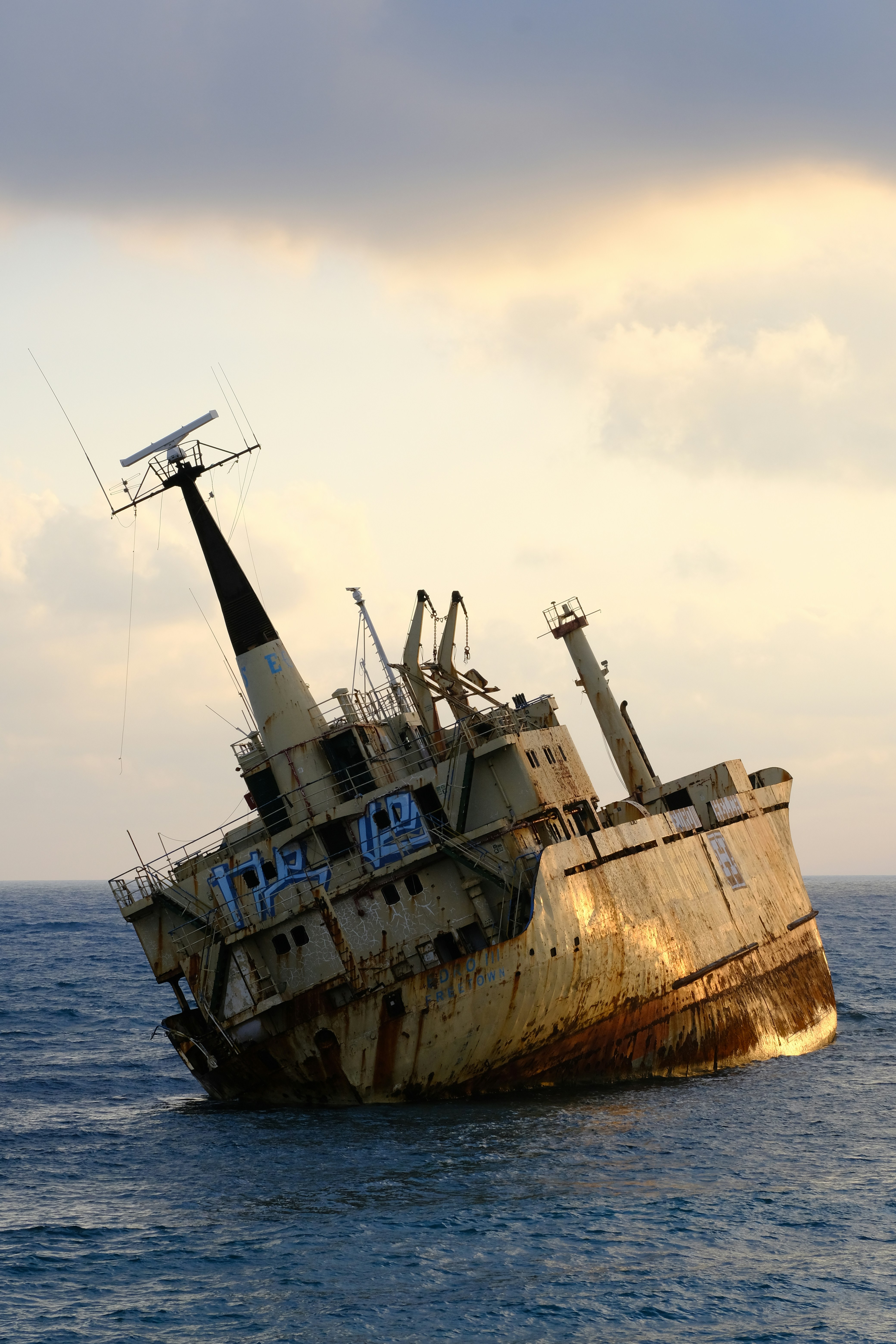 An old ship in the middle of the ocean