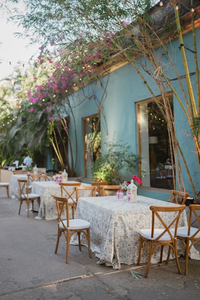 An outdoor dining area with tables and chairs