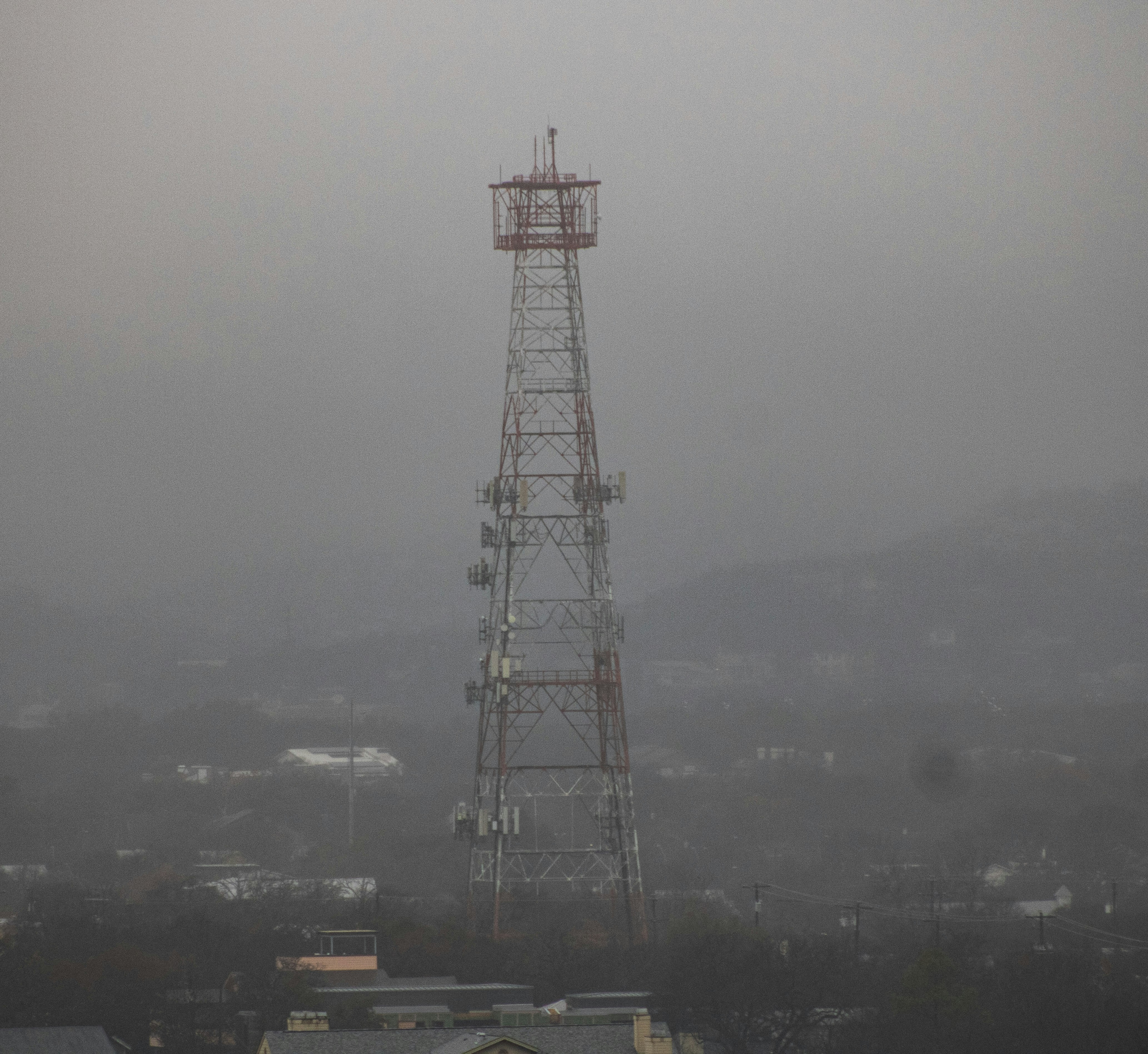 A tall tower with a clock on top of it