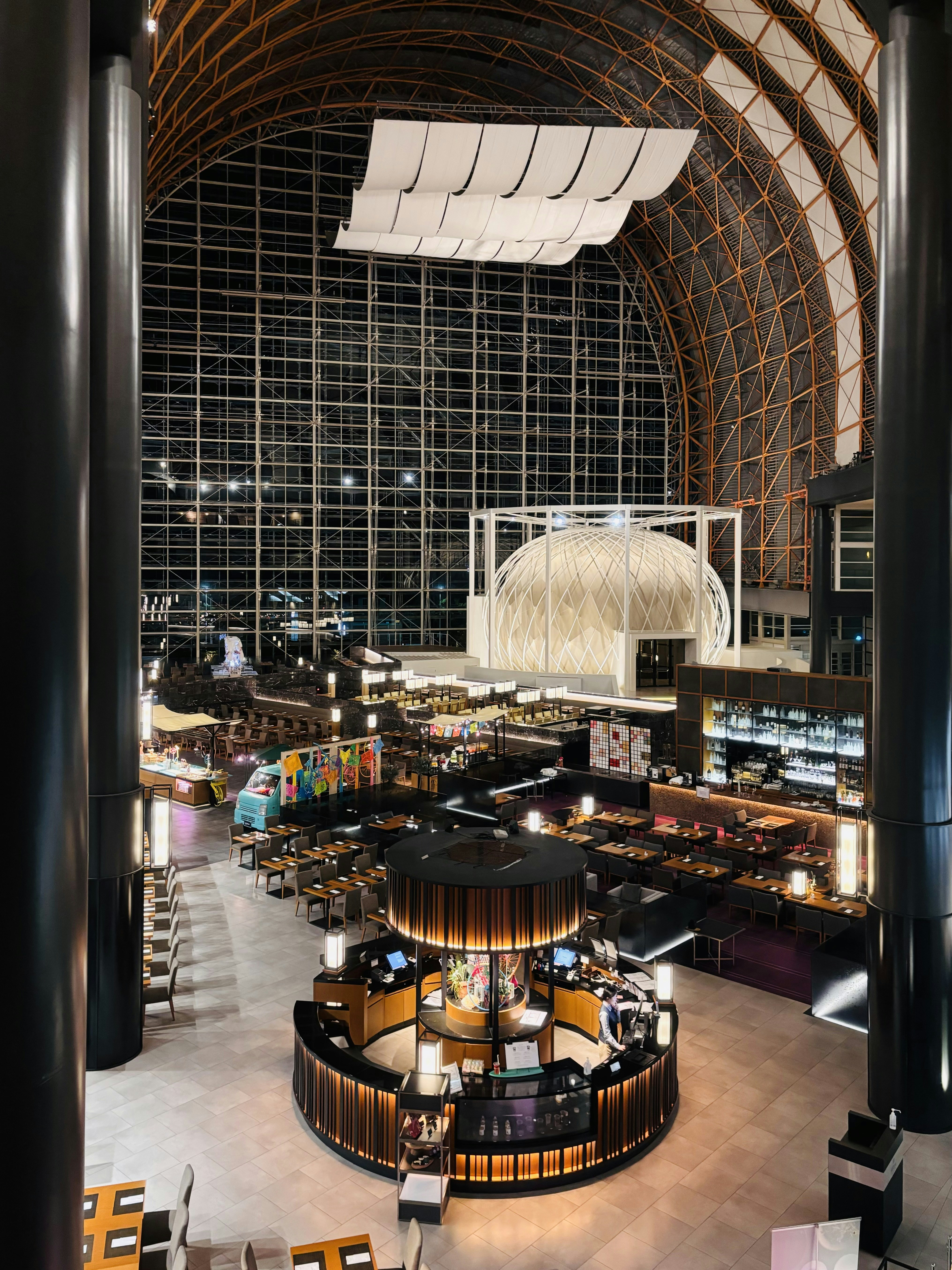 The interior of a large building with a circular ceiling