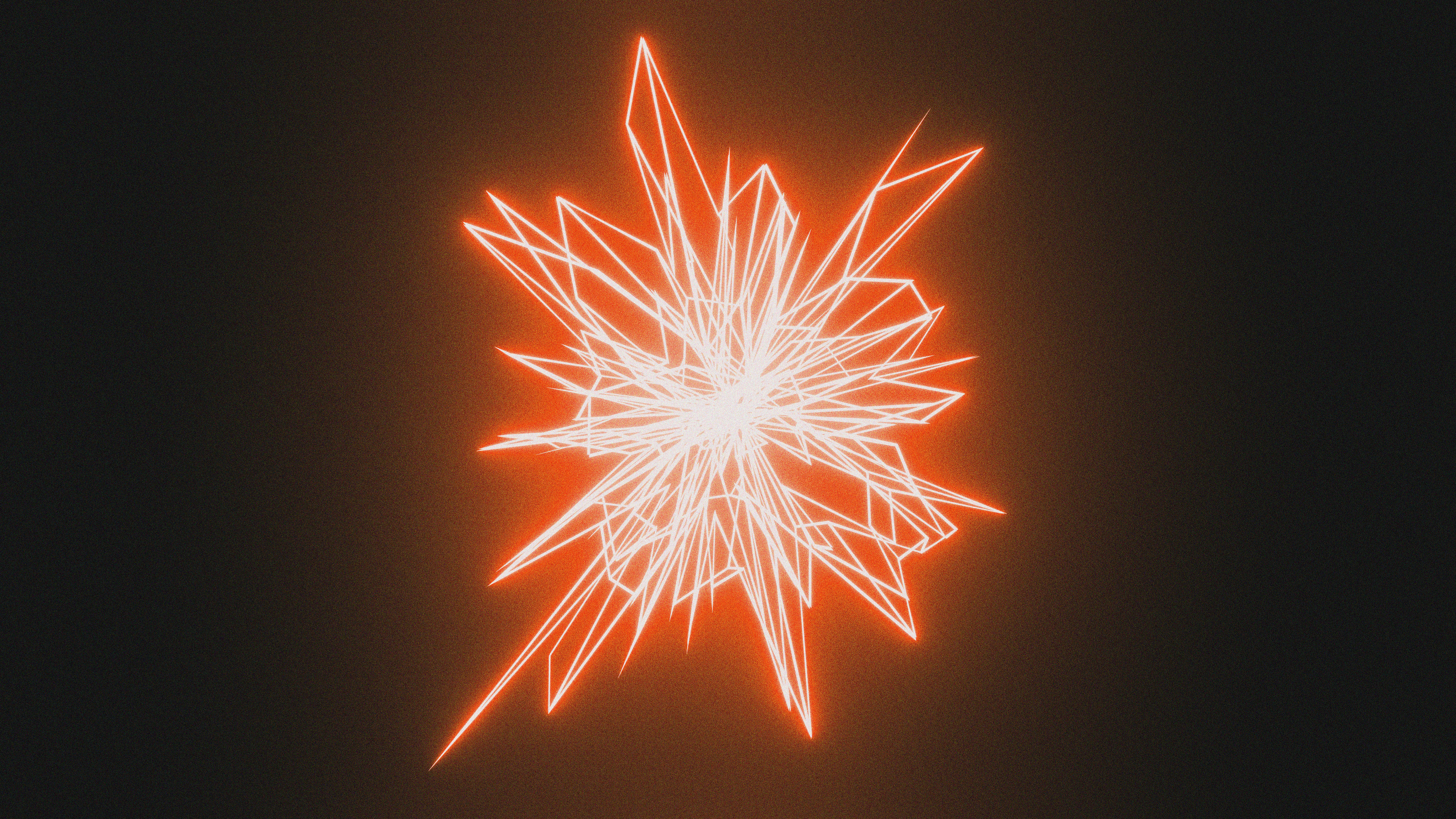 A red and white snowflake on a black background