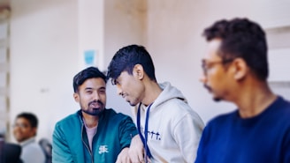 A group of men standing next to each other