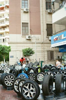 A bunch of tires that are sitting in the street
