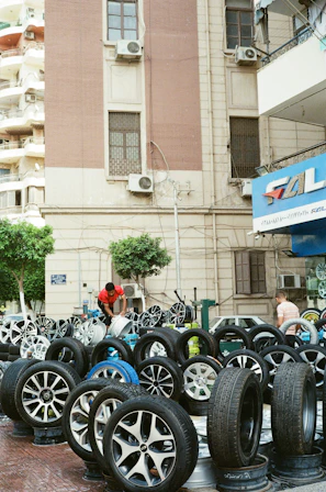 A bunch of tires that are sitting in the street