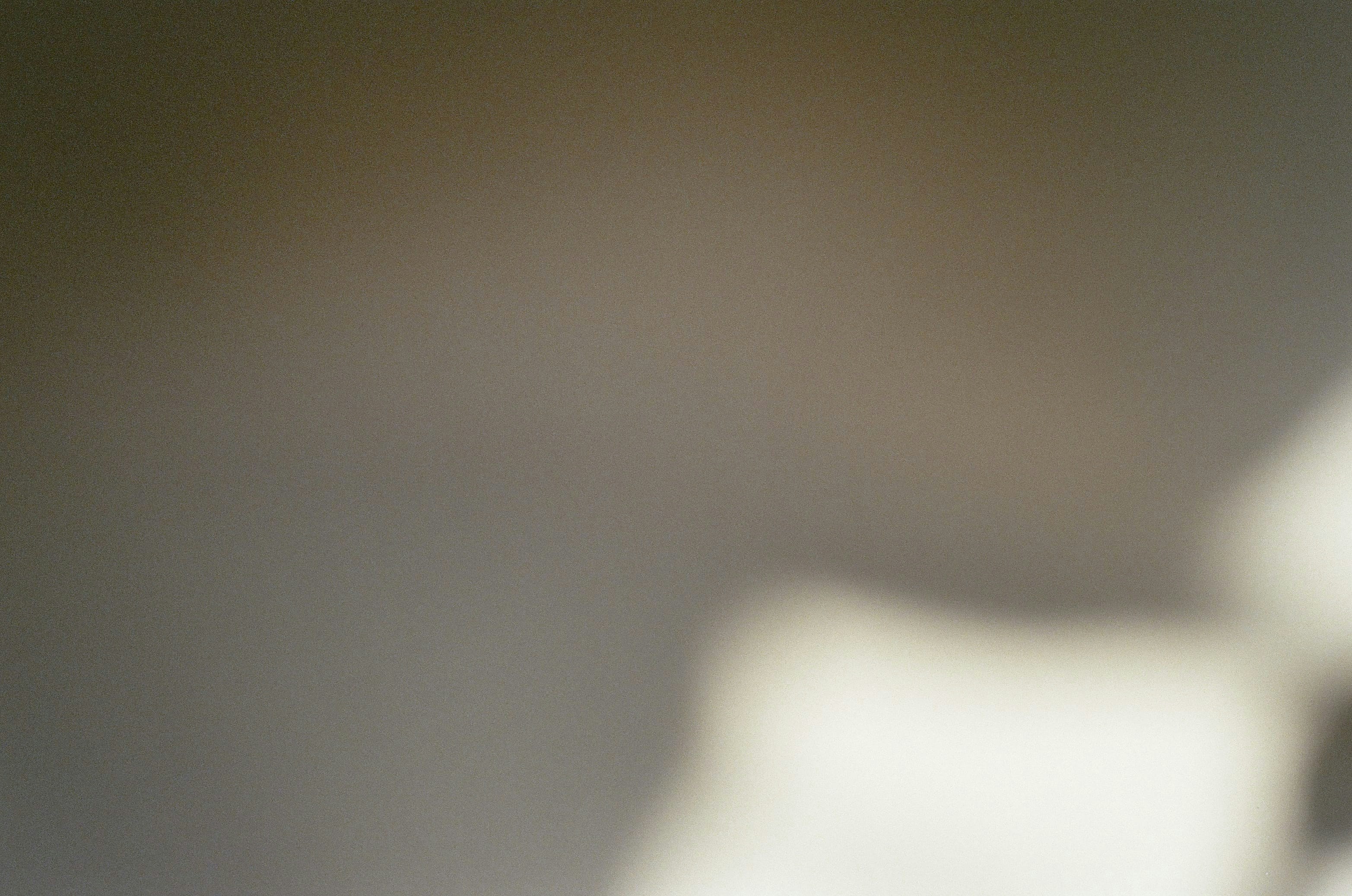 A blurry photo of a white chair