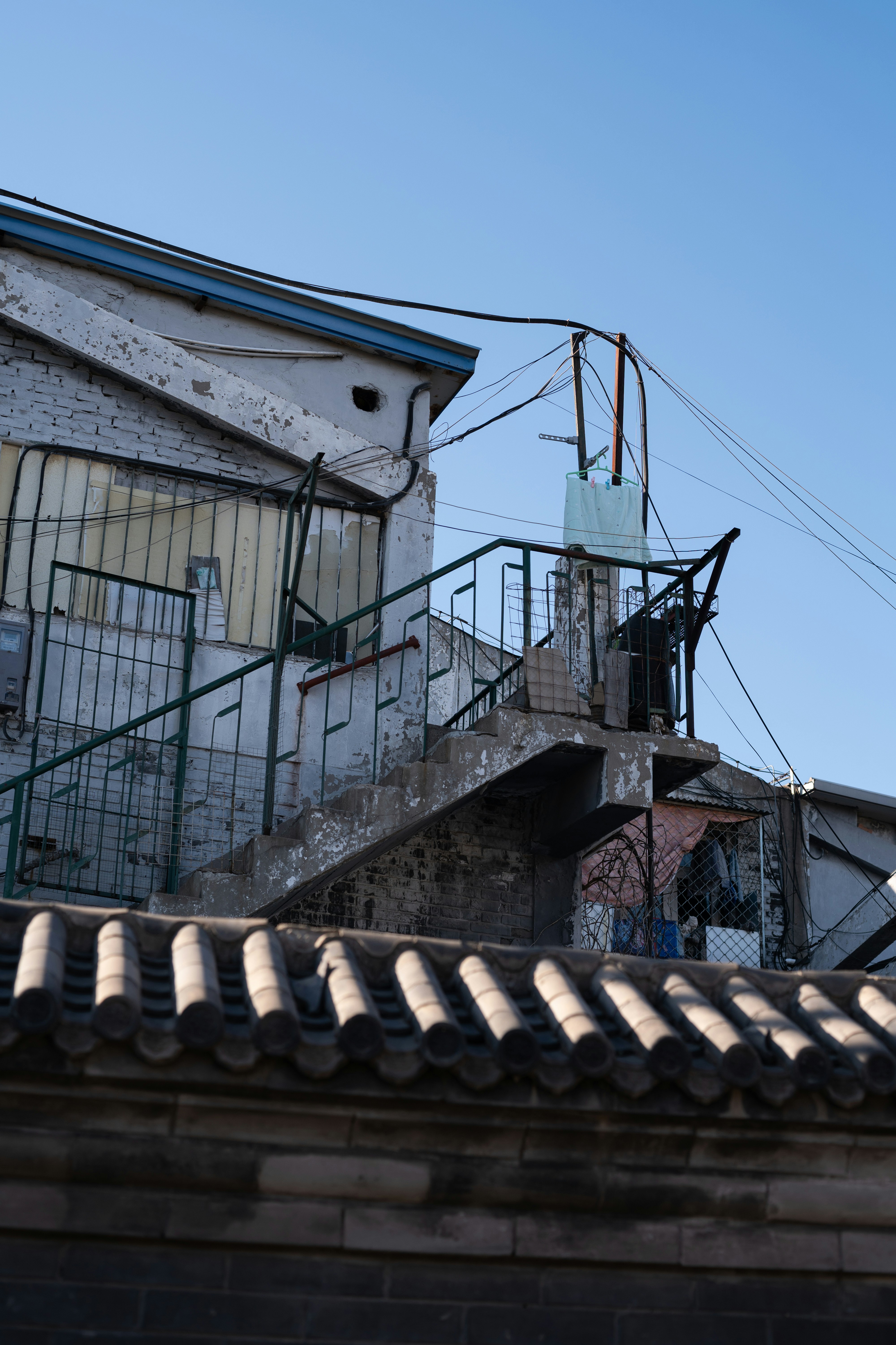 A view of a building from the roof of a building