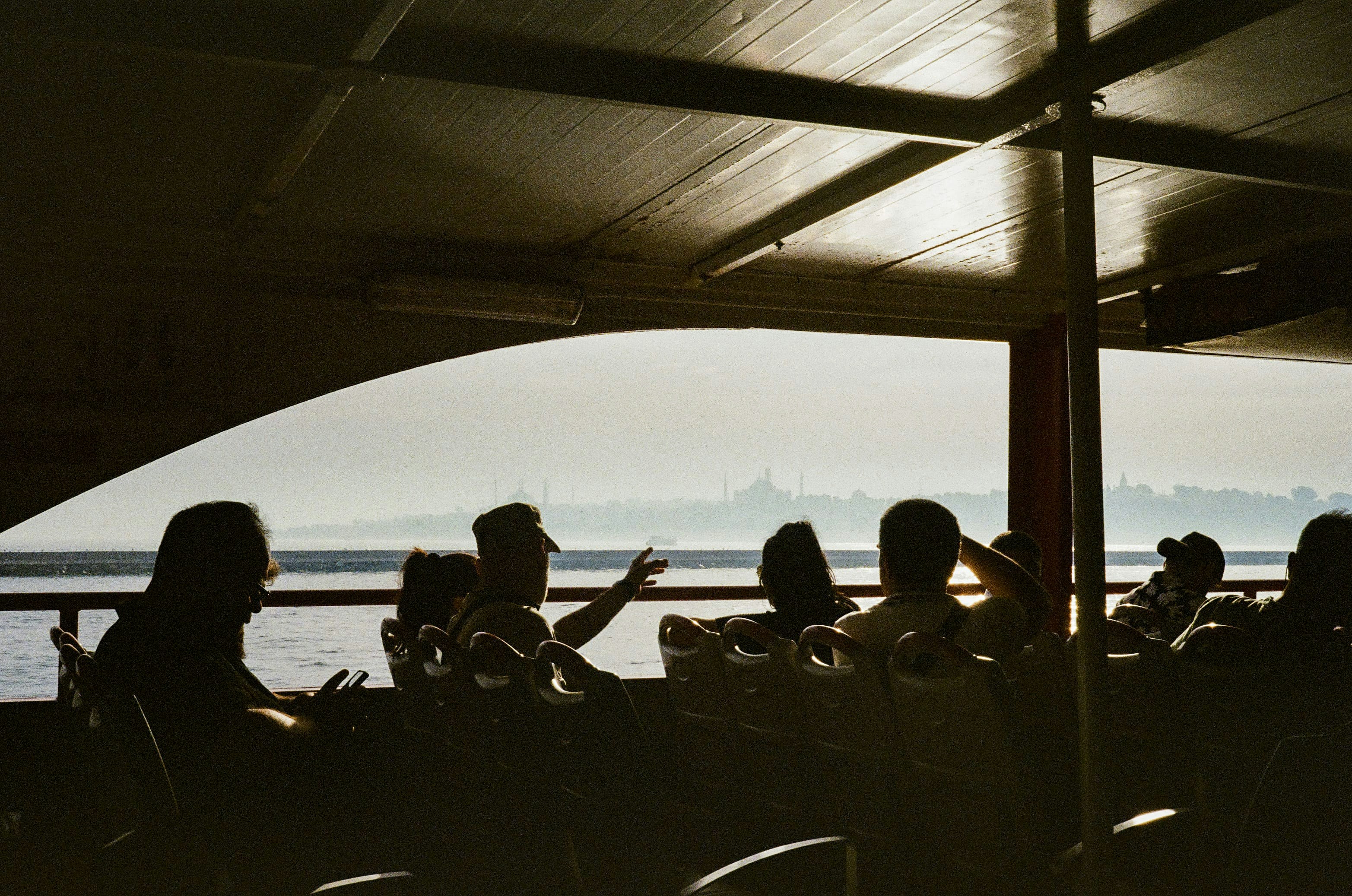 A group of people sitting next to each other