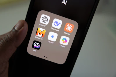 A person holding a smart phone in their hand