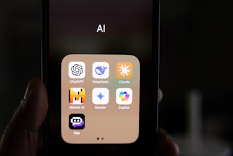 A person holding a smart phone in their hand