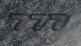 A close up of a black and white logo