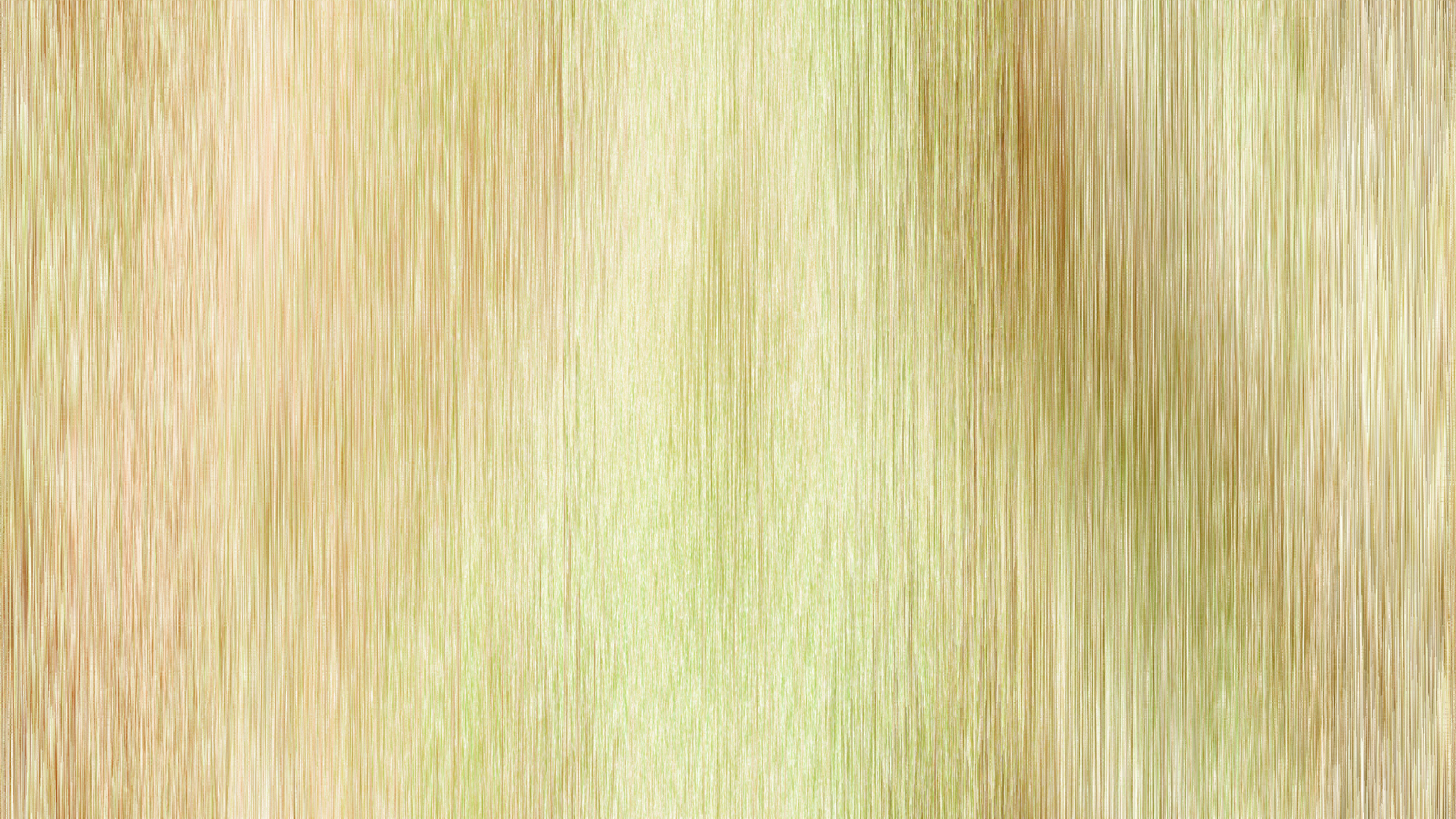 A blurry image of a green and yellow background