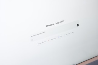 A laptop computer sitting on top of a desk