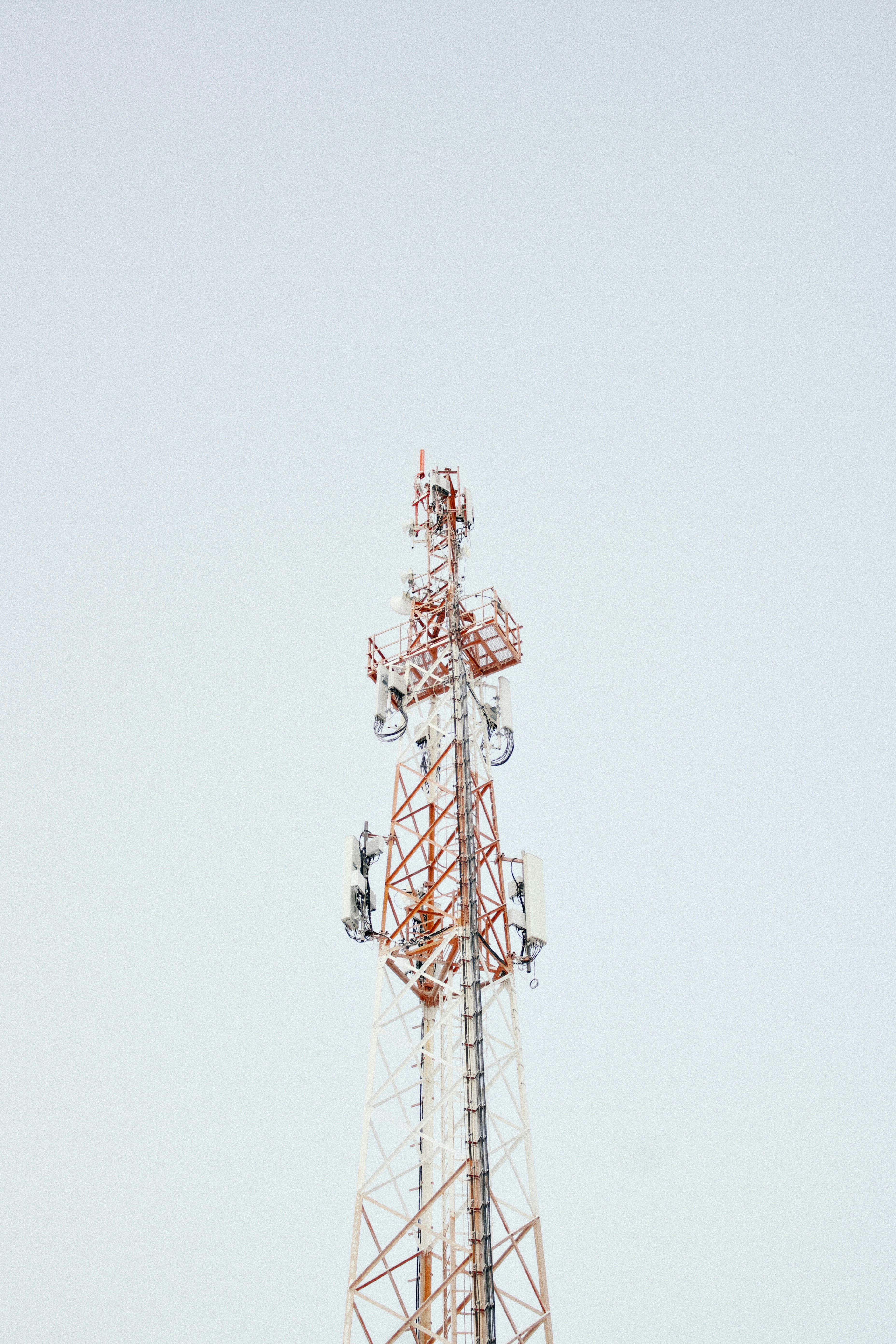 A tall tower with a sky in the background