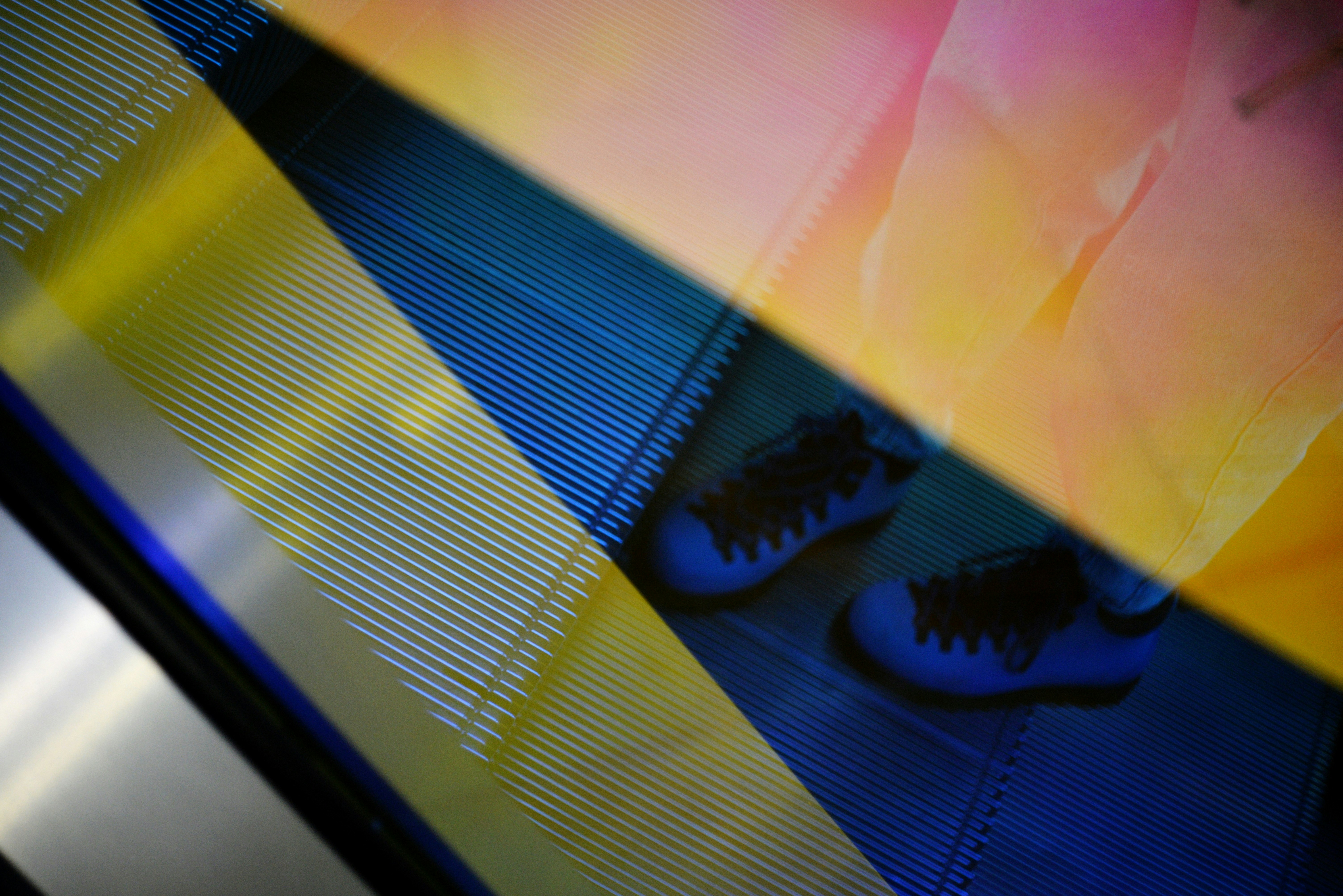 A close up of a multicolored umbrella
