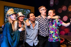 A group of people standing next to each other