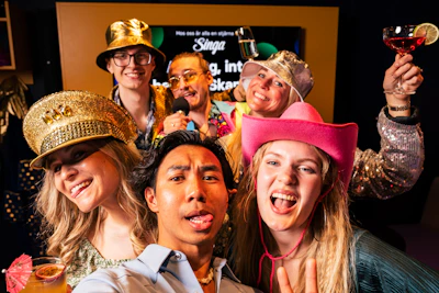 Group in colorful costumes posing together