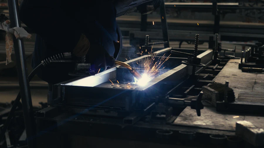Industrial worker performing maintenance in a plant