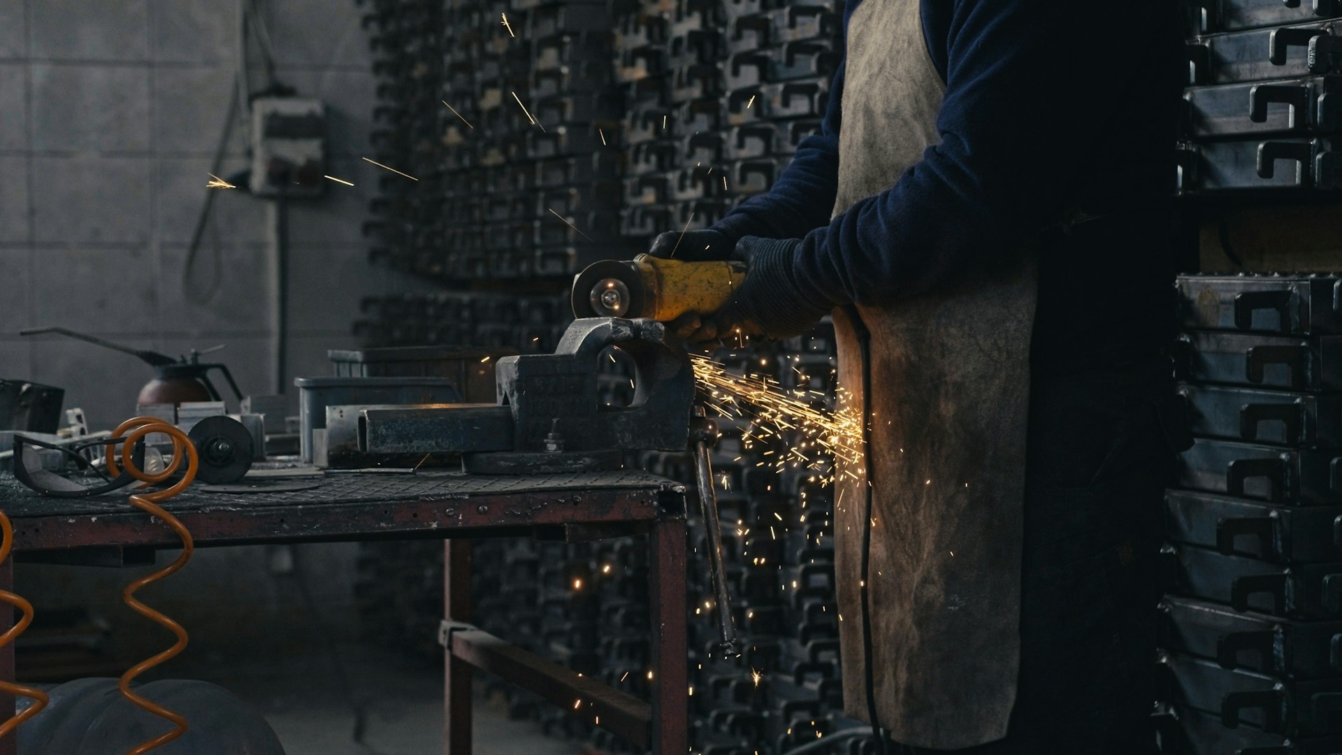 A man working on a machine in a factory