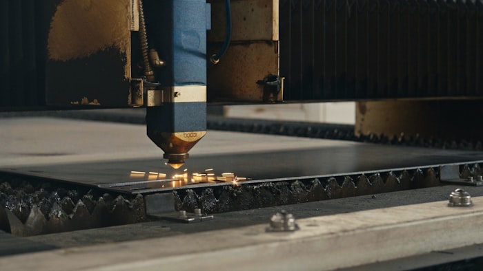 Detailed laser engraving process showing fine pattern being etched into surface