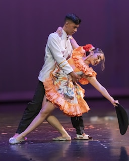 A couple of people that are on a stage