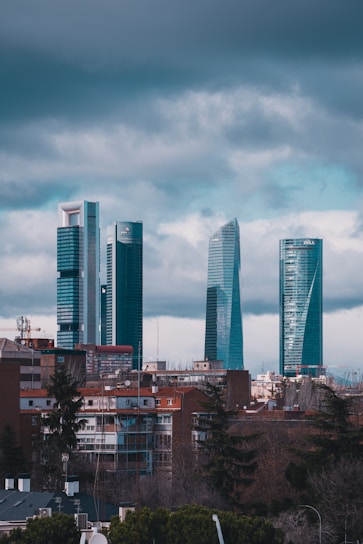 A group of tall buildings sitting next to each other