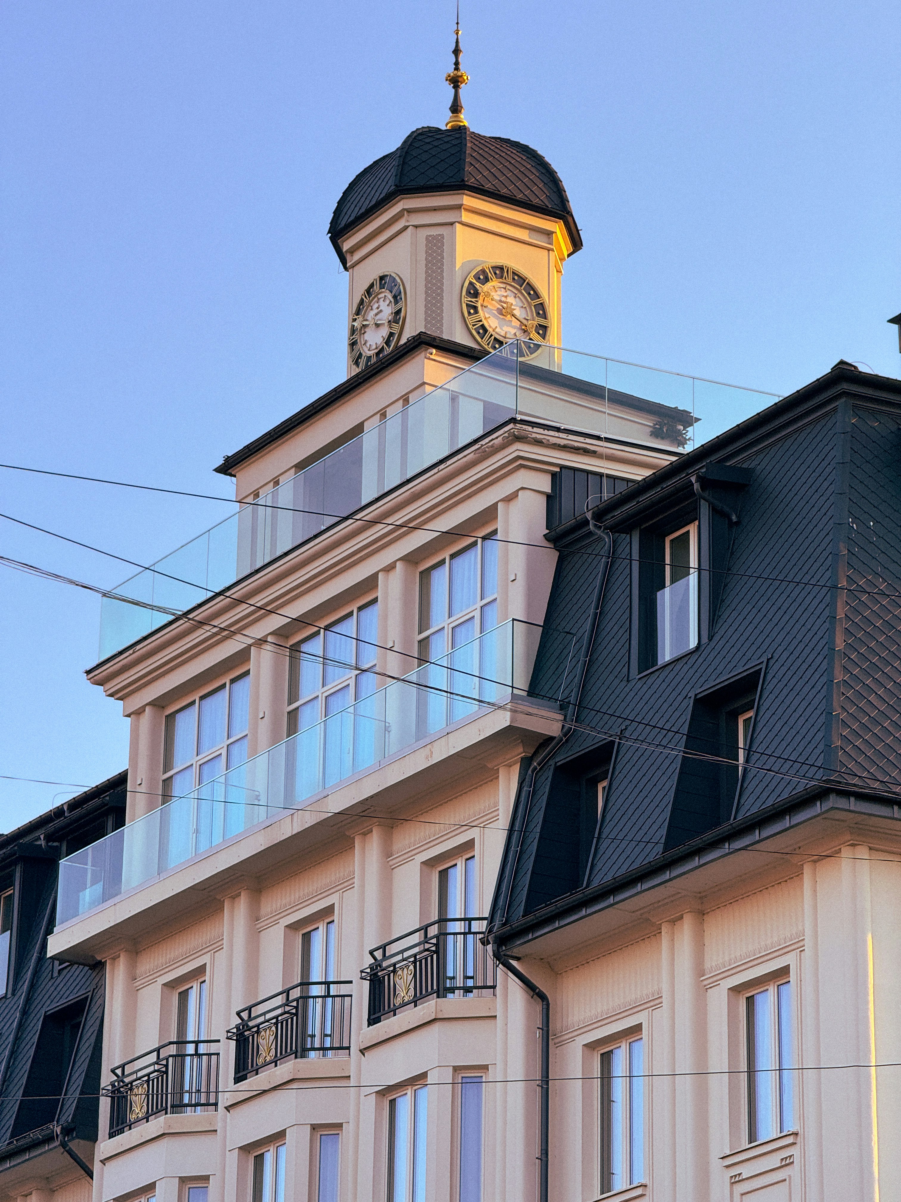 A tall building with a clock on the top of it
