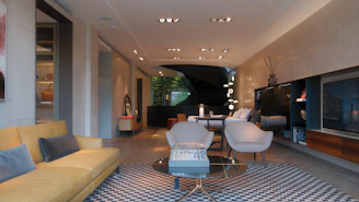 A living room filled with furniture and a flat screen TV
