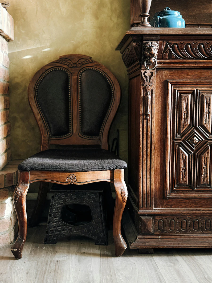 Refinished chair and cabinet in a living room