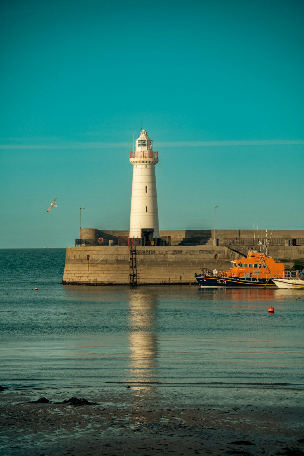 The lighthouse on the harbour at Donaghadee on the North Down coast, Northern Ireland