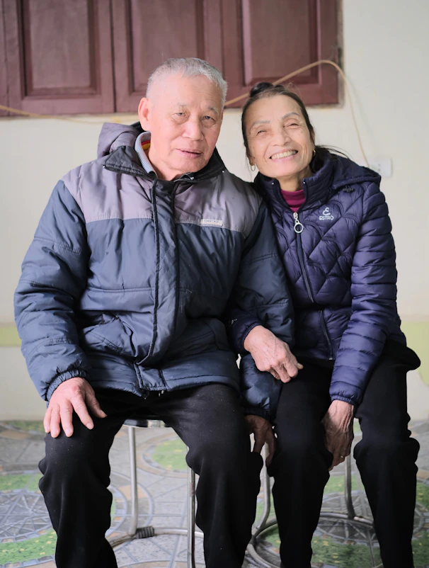 A man and a woman sitting next to each other